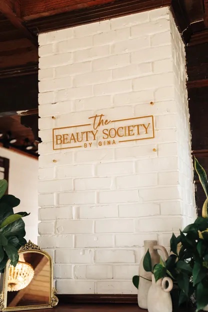 The Beauty Society sign at the salon entrance