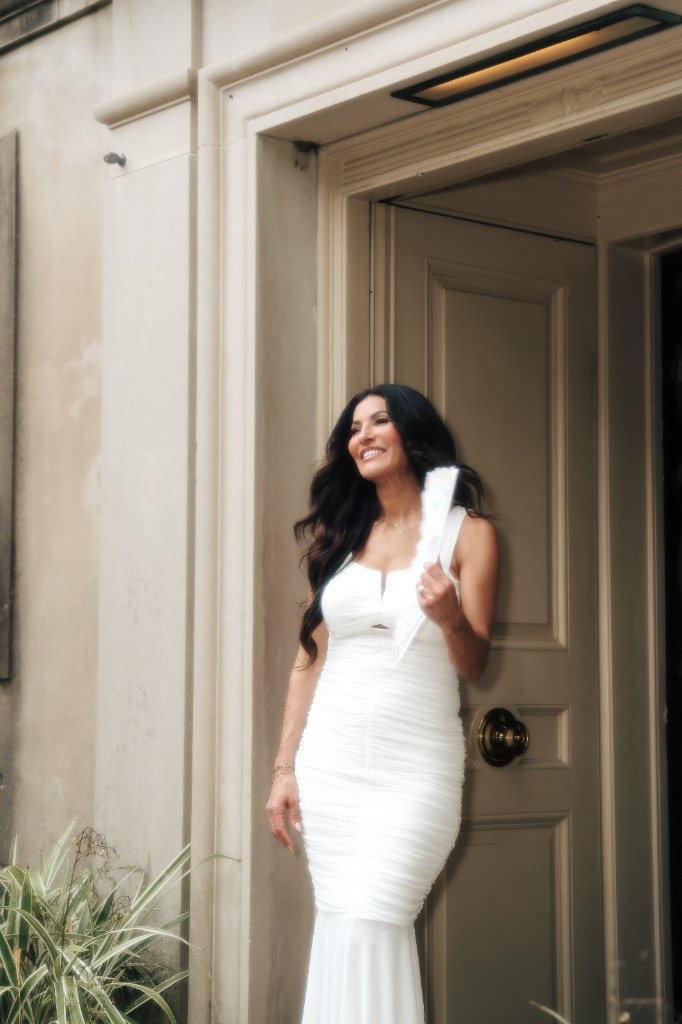 Kirsten Behler standing in an elegant doorway